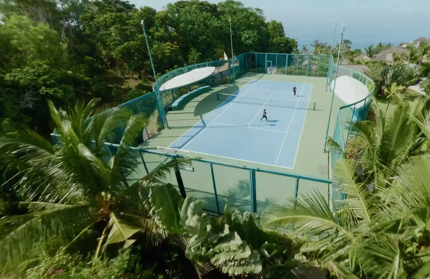 tennis court in bali with a sea view